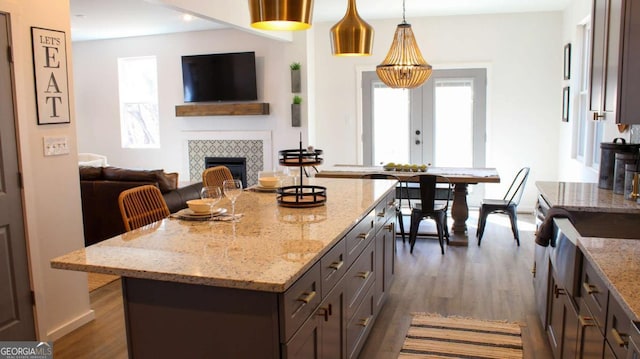 201 Huntington Pl, Dahlonega, GA 30533 - kitchen with open floor plan, dark wood-style floors, healthy amount of natural light, and a kitchen island