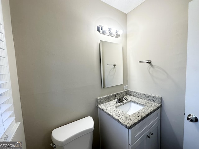 518 Hammett Dr, Decatur, GA 30032 - bathroom featuring toilet and vanity