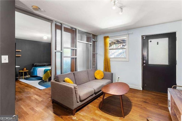 562 Formwalt St SW Unit 5, Atlanta, GA 30312 - living room with baseboards and wood finished floors