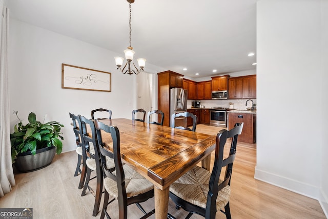 2442 Lower Union Hill Rd, Canton, GA 30115 - dining area featuring a chandelier, light wood finished floors, and recessed lighting