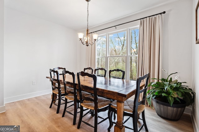 2442 Lower Union Hill Rd, Canton, GA 30115 - dining space with a chandelier and light wood-style floors