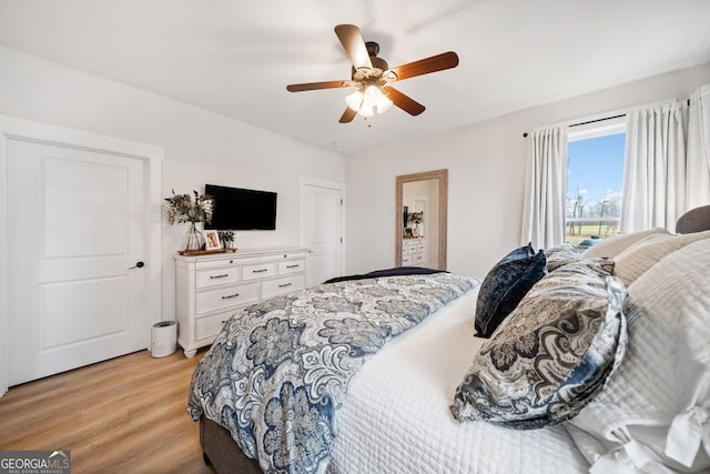 2442 Lower Union Hill Rd, Canton, GA 30115 - bedroom featuring light wood-style floors and a ceiling fan