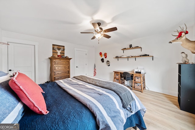 2442 Lower Union Hill Rd, Canton, GA 30115 - bedroom with light wood finished floors and ceiling fan