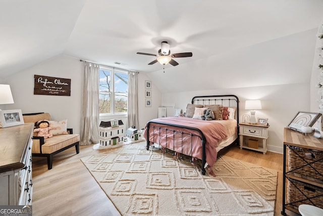 2442 Lower Union Hill Rd, Canton, GA 30115 - bedroom with lofted ceiling, light wood-style flooring, and a ceiling fan