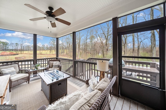 2442 Lower Union Hill Rd, Canton, GA 30115 - sunroom with an outdoor living space with a fire pit, a ceiling fan, and plenty of natural light