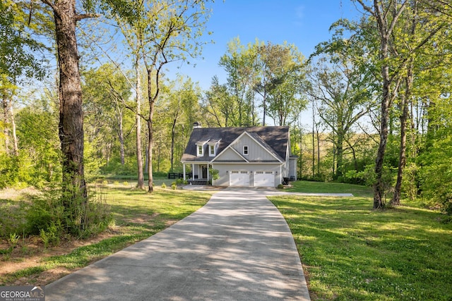 2442 Lower Union Hill Rd, Canton, GA 30115 - view of front of property with driveway, a front yard, a chimney, board and batten siding, and an attached garage