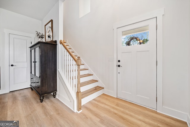 2442 Lower Union Hill Rd, Canton, GA 30115 - entrance foyer with light wood-style floors and stairs