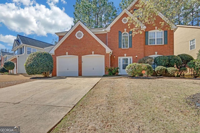 2983 Bancroft Gln NW, Kennesaw, GA 30144 - traditional-style house featuring brick siding, concrete driveway, a garage, and a front yard