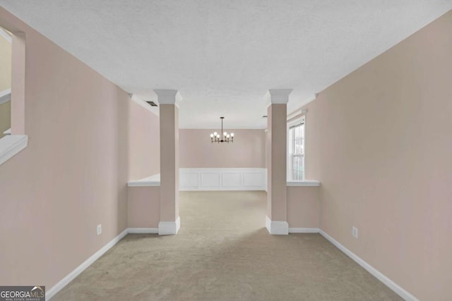 2983 Bancroft Gln NW, Kennesaw, GA 30144 - carpeted spare room with a chandelier and baseboards
