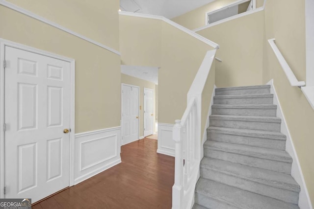 2983 Bancroft Gln NW, Kennesaw, GA 30144 - staircase featuring wood finished floors and wainscoting