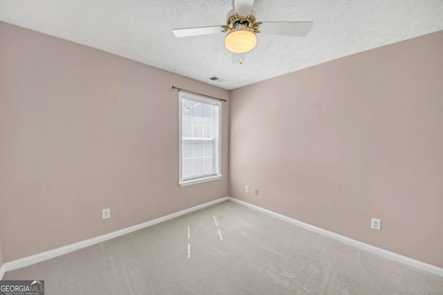 2983 Bancroft Gln NW, Kennesaw, GA 30144 - spare room with carpet and a ceiling fan