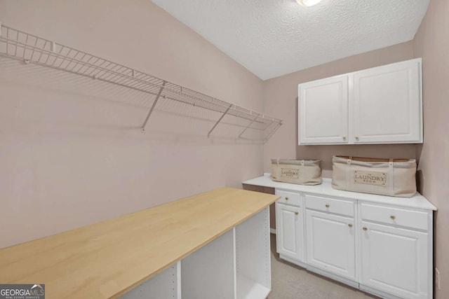 2983 Bancroft Gln NW, Kennesaw, GA 30144 - laundry area with a textured ceiling