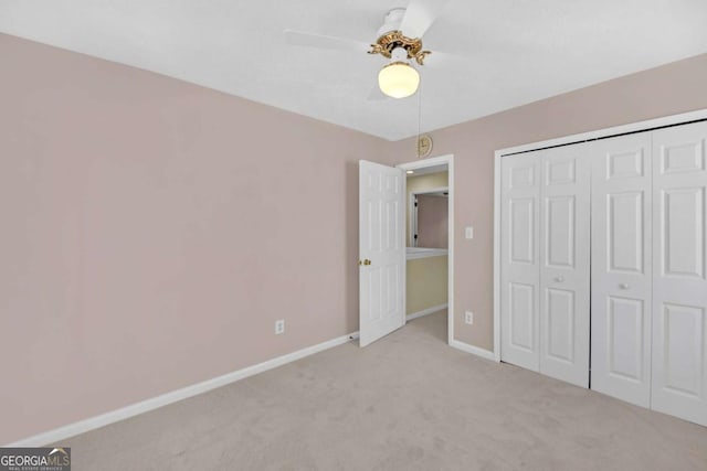 2983 Bancroft Gln NW, Kennesaw, GA 30144 - unfurnished bedroom with carpet flooring, a closet, and ceiling fan
