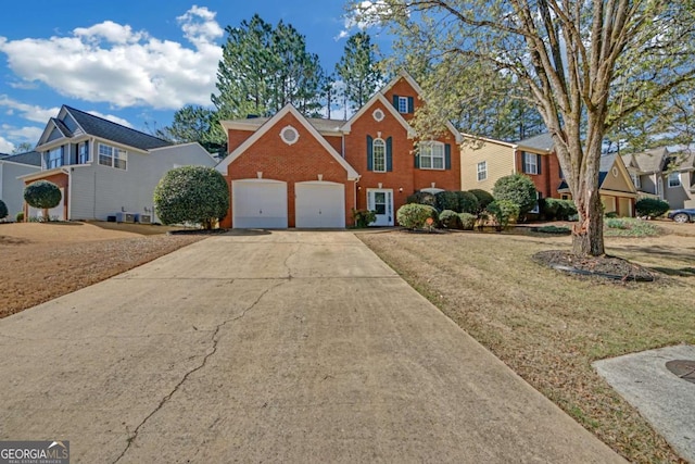 2983 Bancroft Gln NW, Kennesaw, GA 30144 - traditional-style home with brick siding, driveway, an attached garage, a front yard, and a residential view