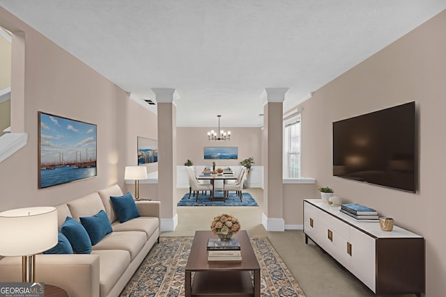 2983 Bancroft Gln NW, Kennesaw, GA 30144 - living area featuring a chandelier and decorative columns