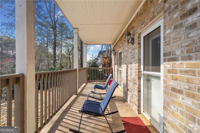 balcony featuring a porch