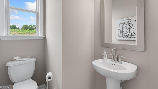 52 Sheryl Way, Loganville, GA 30052 - bathroom with toilet and a sink