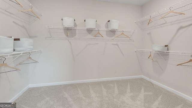 52 Sheryl Way, Loganville, GA 30052 - spacious closet featuring carpet flooring