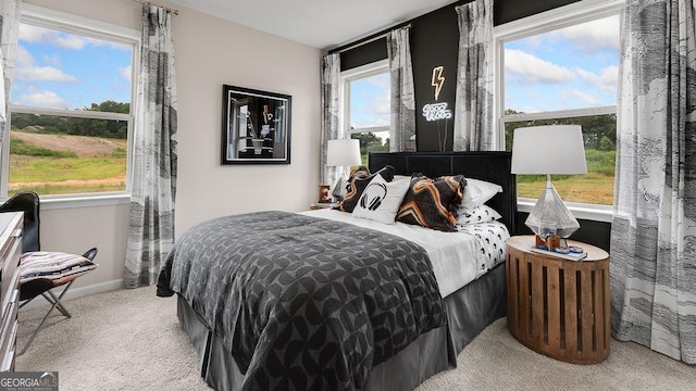 52 Sheryl Way, Loganville, GA 30052 - bedroom featuring light carpet and baseboards