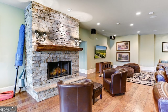 2373 Herman Drake Rd, Young Harris, GA 30582 - living area with light wood finished floors, baseboards, a stone fireplace, and recessed lighting