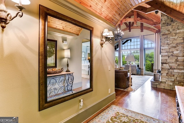 2373 Herman Drake Rd, Young Harris, GA 30582 - interior space featuring wood ceiling, lofted ceiling with beams, wood finished floors, arched walkways, and a notable chandelier