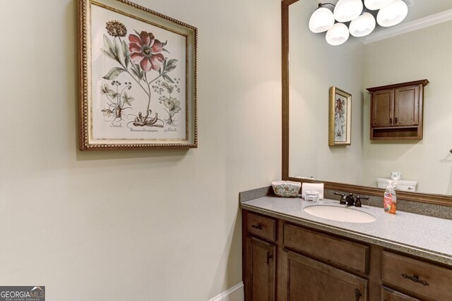 2373 Herman Drake Rd, Young Harris, GA 30582 - bathroom featuring crown molding, an inviting chandelier, and vanity