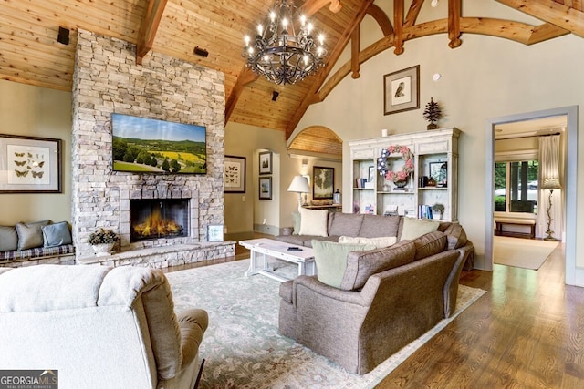 2373 Herman Drake Rd, Young Harris, GA 30582 - living area with wooden ceiling, a chandelier, a fireplace, wood finished floors, and beamed ceiling