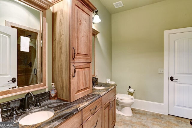 2373 Herman Drake Rd, Young Harris, GA 30582 - bathroom with a shower stall, double vanity, visible vents, and a sink
