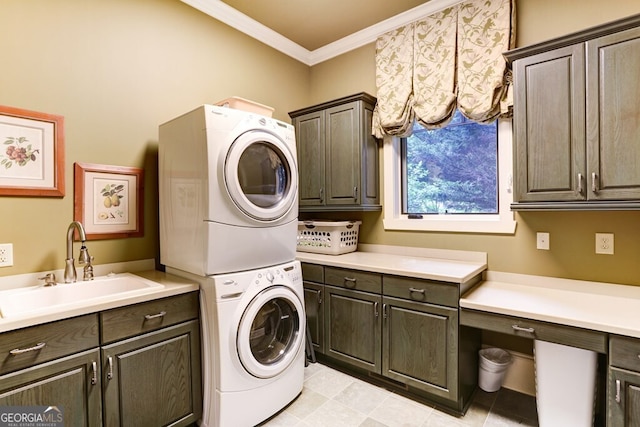 2373 Herman Drake Rd, Young Harris, GA 30582 - washroom with stacked washing maching and dryer, crown molding, cabinet space, and a sink