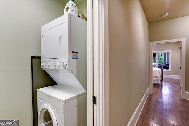 2373 Herman Drake Rd, Young Harris, GA 30582 - laundry room with laundry area, dark wood-style floors, baseboards, and stacked washing maching and dryer