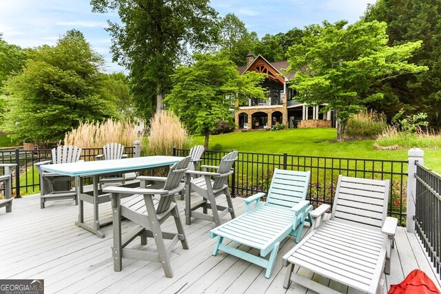 2373 Herman Drake Rd, Young Harris, GA 30582 - wooden terrace featuring outdoor dining space and a lawn