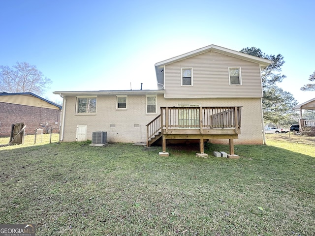 2317 Emerald Springs Dr, Decatur, GA 30035 - back of house with fence, central AC unit, a deck, brick siding, and a yard