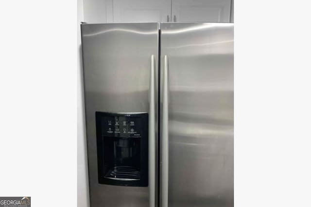 3834 Kensingwood Trce, Decatur, GA 30032 - interior details with white cabinetry and stainless steel fridge