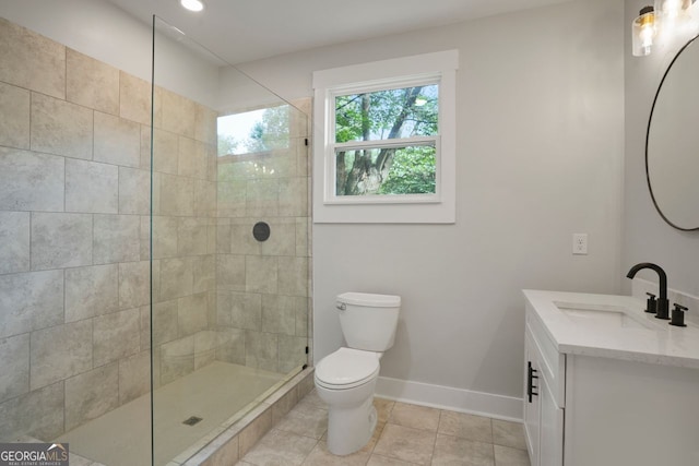 1441 Ezra Church Dr NW, Atlanta, GA 30314 - bathroom with baseboards, toilet, vanity, a walk in shower, and tile patterned flooring