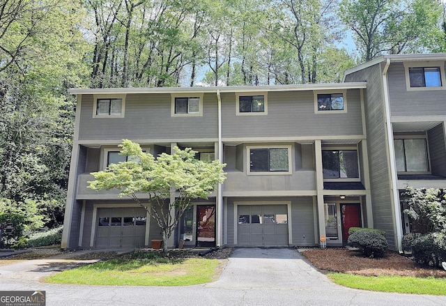 2929 Torreya Way SE, Marietta, GA 30067 - view of property with a garage and asphalt driveway