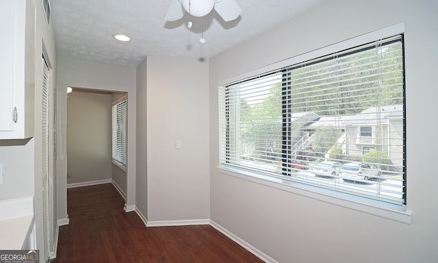 2929 Torreya Way SE, Marietta, GA 30067 - hallway featuring baseboards, wood finished floors, and a textured ceiling
