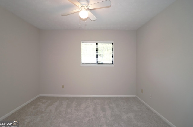 2929 Torreya Way SE, Marietta, GA 30067 - empty room featuring light carpet, baseboards, and ceiling fan