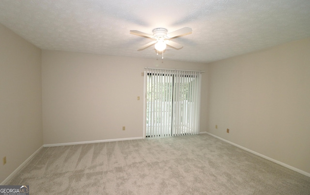 2929 Torreya Way SE, Marietta, GA 30067 - unfurnished room with ceiling fan, light carpet, and a textured ceiling