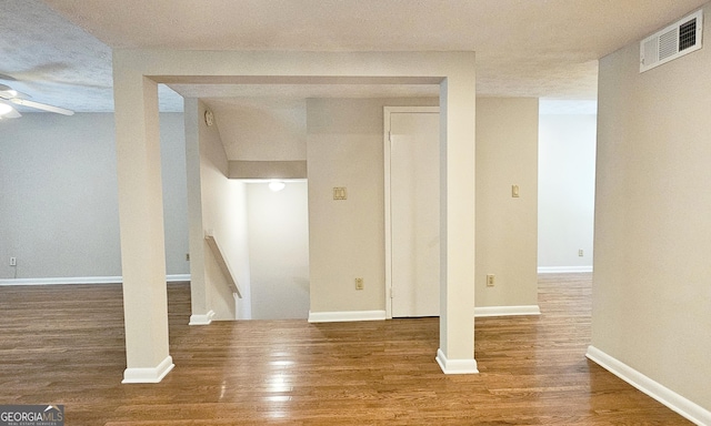 2929 Torreya Way SE, Marietta, GA 30067 - below grade area with wood finished floors, ceiling fan, and baseboards