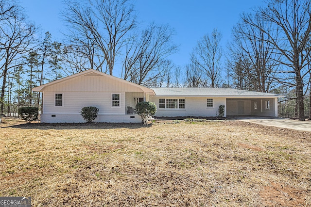 9640 Cedar Grove Rd, Fairburn, GA 30213 - ranch-style home featuring crawl space, concrete driveway, a carport, and a front lawn