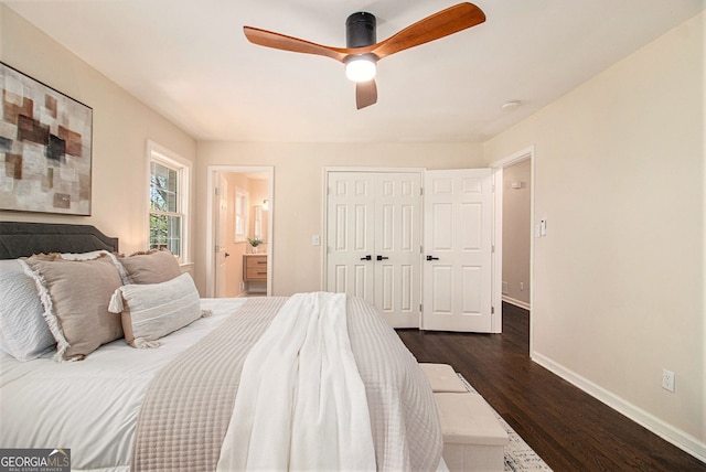 9640 Cedar Grove Rd, Fairburn, GA 30213 - bedroom featuring baseboards, dark wood finished floors, ensuite bath, a closet, and ceiling fan