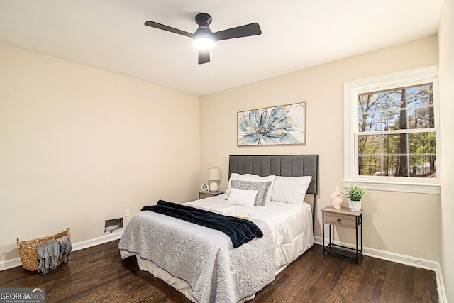 9640 Cedar Grove Rd, Fairburn, GA 30213 - bedroom with wood finished floors, baseboards, and ceiling fan