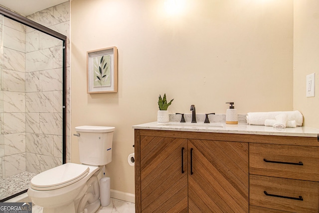 9640 Cedar Grove Rd, Fairburn, GA 30213 - bathroom with marble look tile flooring, toilet, a shower stall, vanity, and baseboards