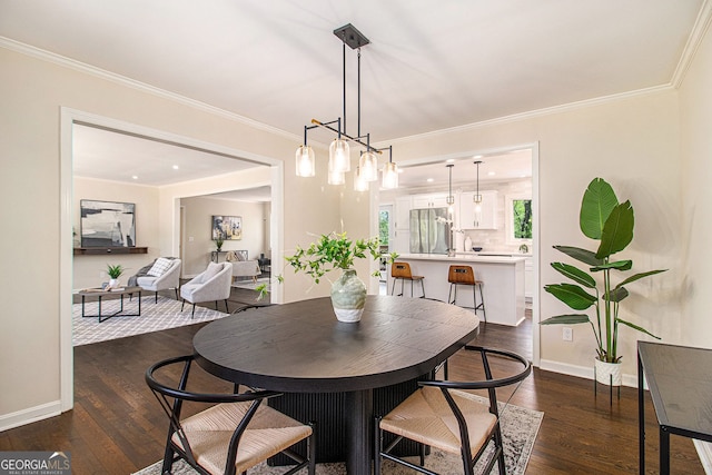 9640 Cedar Grove Rd, Fairburn, GA 30213 - dining space featuring dark wood-type flooring, ornamental molding, and baseboards