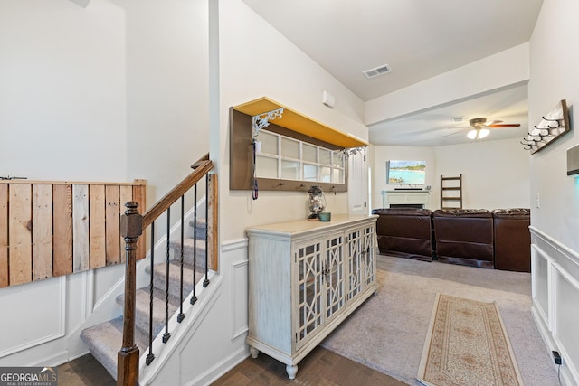 6018 Cloverfield Way, Braselton, GA 30517 - stairway featuring ceiling fan, a fireplace, and wood finished floors