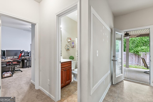 6018 Cloverfield Way, Braselton, GA 30517 - hallway featuring an office area, baseboards, and french doors
