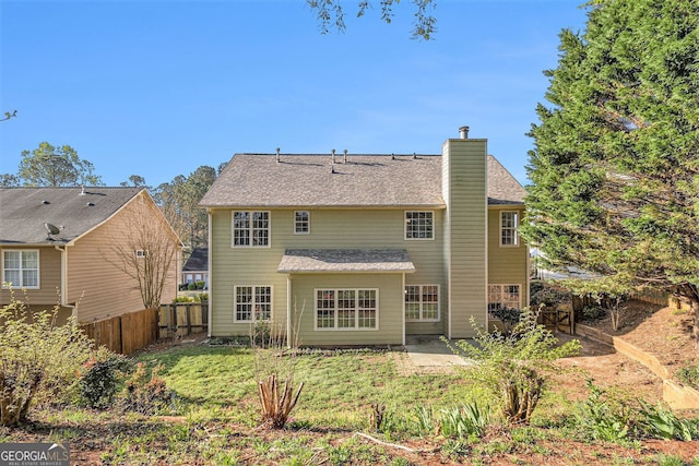 3707 Mcguire St NW, Kennesaw, GA 30144 - rear view of property featuring a chimney and a patio area