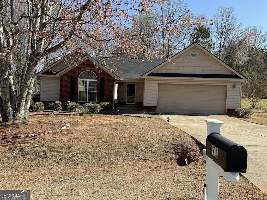 71 Bryant Ct, Hull, GA 30646 - ranch-style house with brick siding, concrete driveway, and a garage