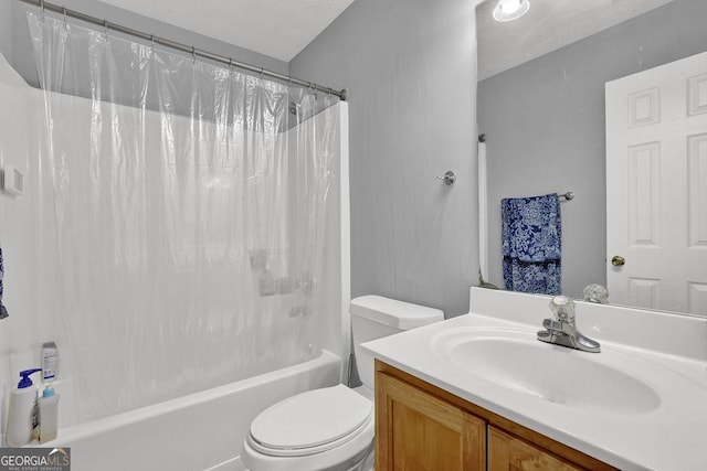 full bathroom with toilet, vanity, and shower / bath combination with curtain