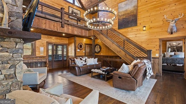 68 Shalom Vw, Blue Ridge, GA 30513 - living area featuring wooden walls, high vaulted ceiling, hardwood / wood-style floors, and a chandelier